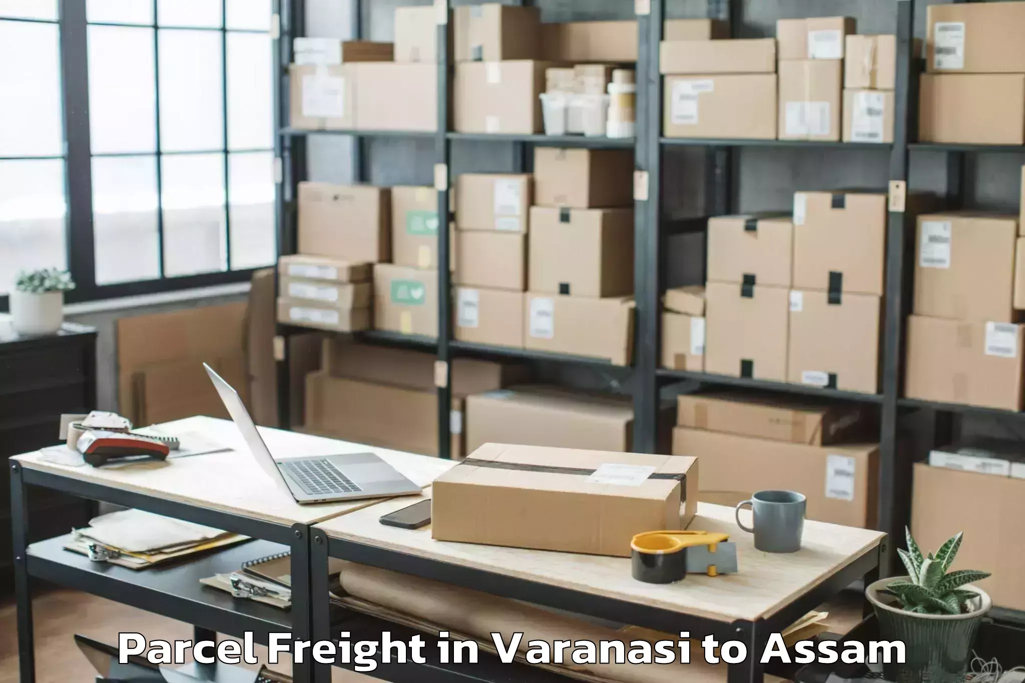 Book Varanasi to Moran Parcel Freight